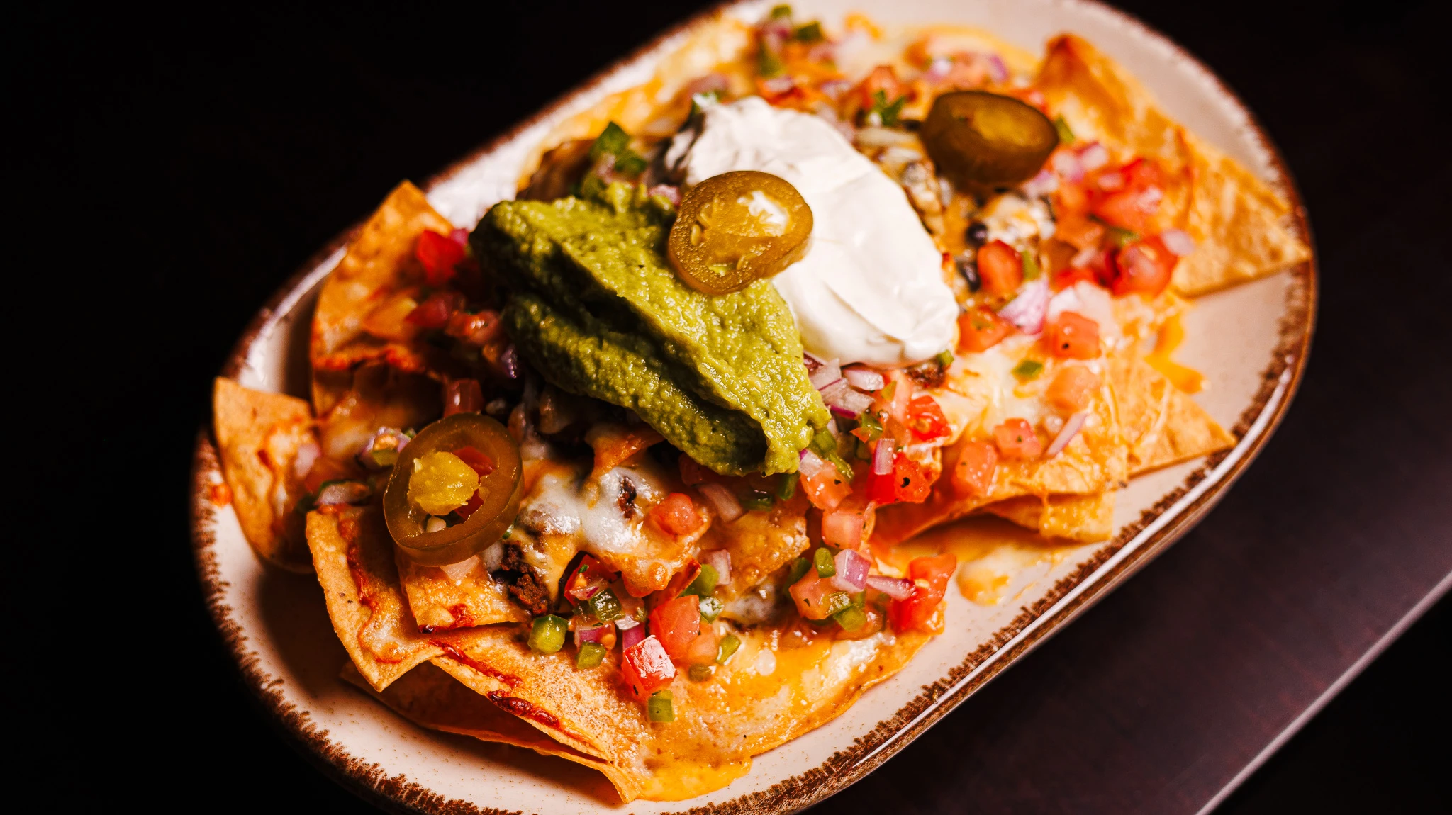 /images/dishes/entrantes/nachos-espaciales.webp